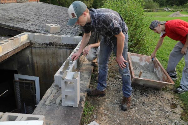 Wisconsin Academy Industrial Arts Students Laying Cement Block