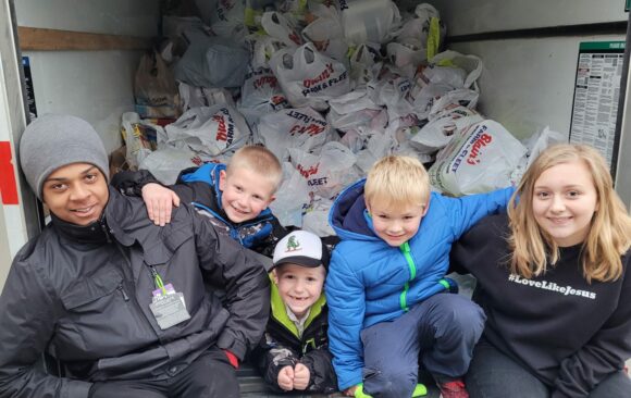 Monroe Pathfinder/Adventurer Clubs Collect 3,386 Pounds of Food for Community