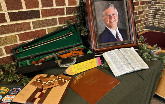 Many Attend Memorial Service for Elder Mike Edge